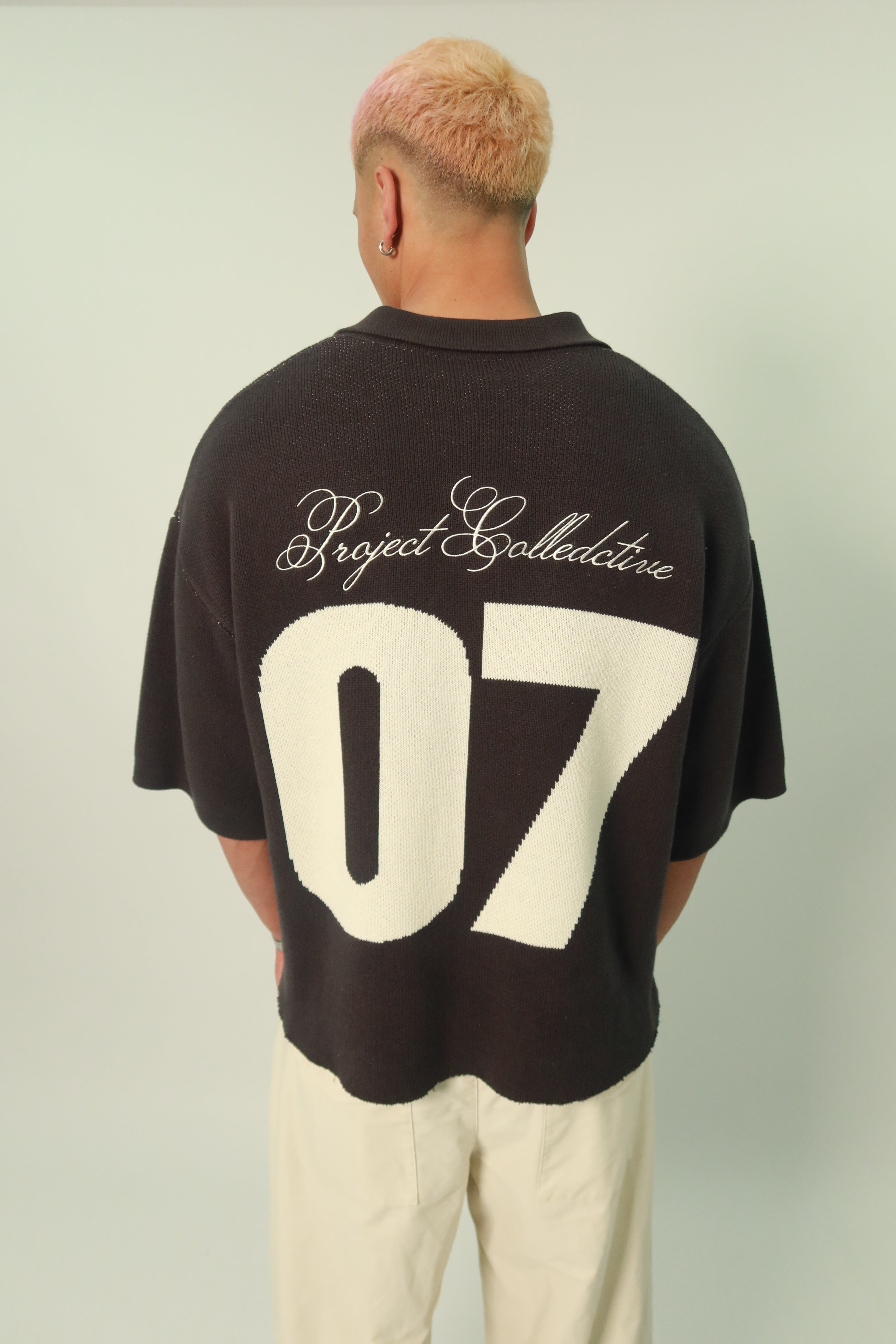 "For the collective" knit polo tee